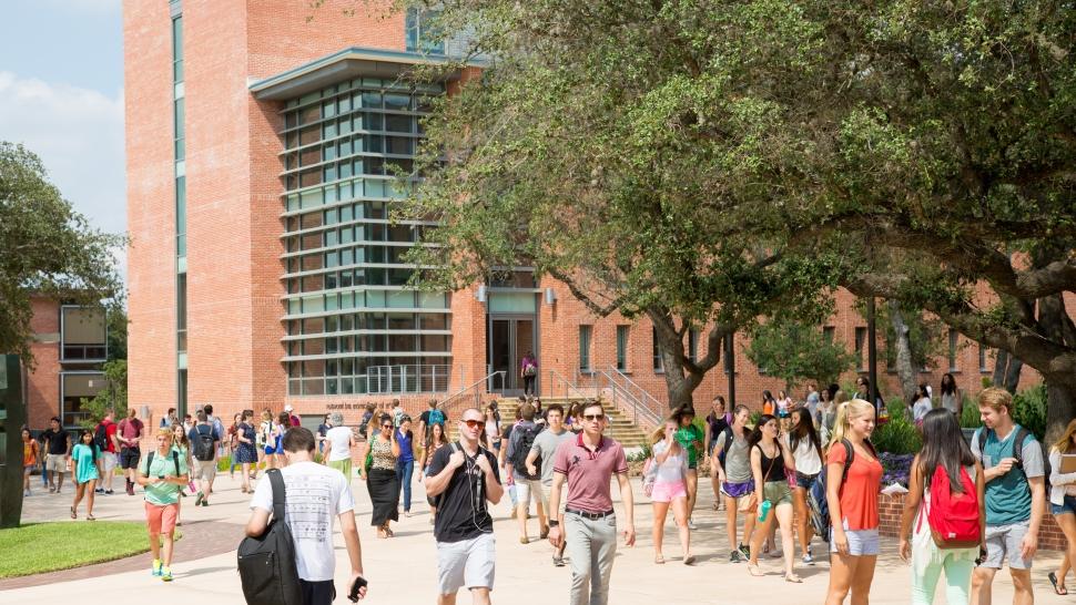 Students walk across campus on first day of classes