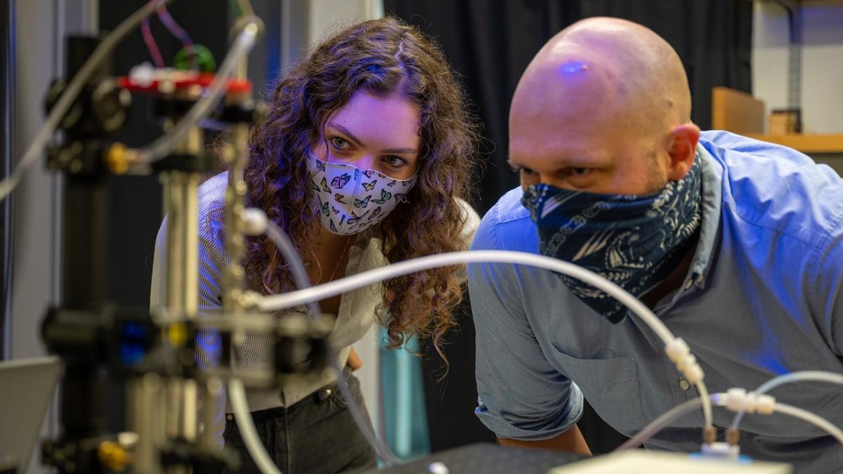 Ryan Davis and Josefina Hajek-Herrera in a chemistry lab